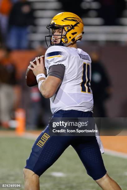 Toledo Rockets quarterback Logan Woodside looks for an open receiver during second half game action between the Toledo Rockets and the Bowling Green...