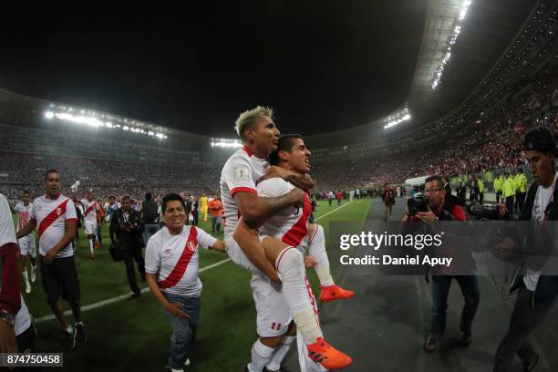 Raul Ruidiaz and ALdo Corzo of Peru celebrate after winning the second leg match between Peru and New Zealand as part of the 2018 FIFA World Cup...