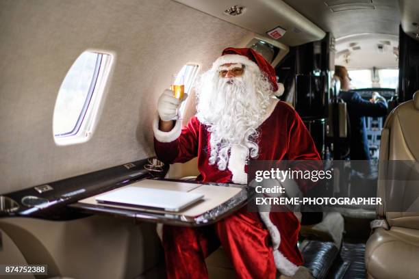santa claus in private jet airplane - beard pilot stock pictures, royalty-free photos & images
