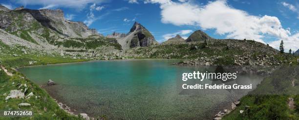 lago bianco (white lake) panoramic view, alpe veglia natural park - veglia stock-fotos und bilder