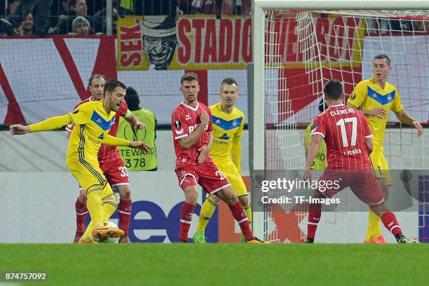 Nemanja Milunovic of BATE Borisov scores the team`s first goal during the UEFA Europa League group H match between 1. FC Koeln and BATE Borisov at...