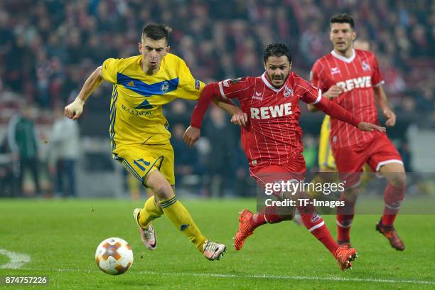 Aleksei Rios of BATE Borisov and Leonardo Bittencourt of Koeln battle for the ball during the UEFA Europa League group H match between 1. FC Koeln...