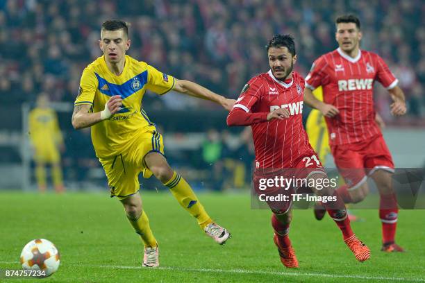 Aleksei Rios of BATE Borisov and Leonardo Bittencourt of Koeln battle for the ball during the UEFA Europa League group H match between 1. FC Koeln...