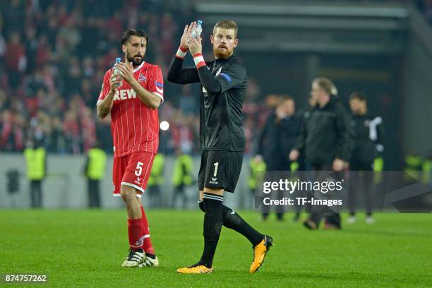 Dominic Maroh of Koeln and Goalkeeper Timo Horn of Koeln gesture during the UEFA Europa League group H match between 1. FC Koeln and BATE Borisov at...