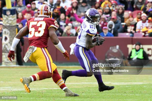 Minnesota Vikings running back Jerick McKinnon catches a pass against Washington Redskins inside linebacker Zach Brown on November 12 at FedEx Field...