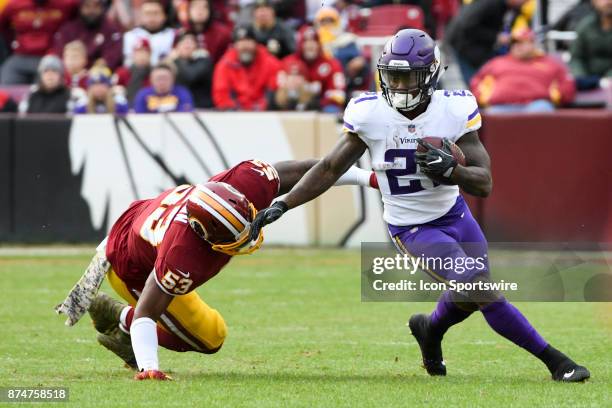 Minnesota Vikings running back Jerick McKinnon catches a pass against Washington Redskins inside linebacker Zach Brown on November 12 at FedEx Field...