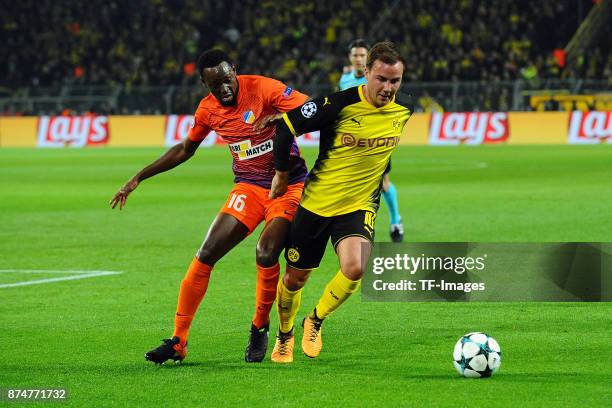 Vinicius of Nikosia and Mario Goetze of Dortmund battle for the ball during the UEFA Champions League Group H soccer match between Borussia Dortmund...