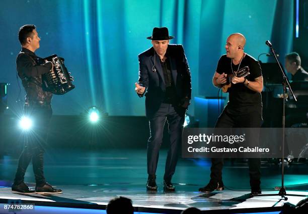 Jimmy Zambrano, Santiago Cruz, and Gian Marco perform onstage during the 2017 Person of the Year Gala honoring Alejandro Sanz at the Mandalay Bay...