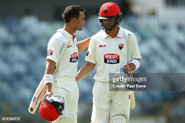 Jake Weatherald and Callum Ferguson of South Australia walk from the field at the tea break during day four of the Sheffield Shield match between...