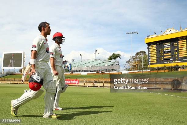 Jake Weatherald and Callum Ferguson of South Australia walk from the field at the tea break during day four of the Sheffield Shield match between...