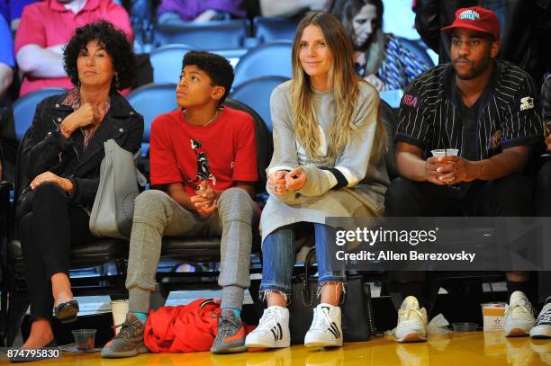 Heidi Klum and son Henry attend a basketball game between the Los Angeles Lakers and the Philadelphia 76ers at Staples Center on November 15, 2017 in...