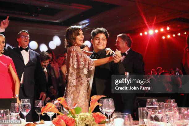 Raquel Perera watches Alejandro Sanz perform during the 2017 Person of the Year Gala honoring Alejandro Sanz at the Mandalay Bay Convention Center on...