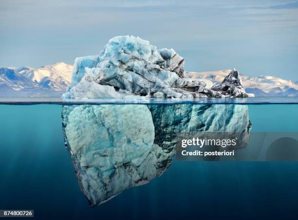 eisberg über und unter wasser mit blick auf die - iceberg stock-fotos und bilder