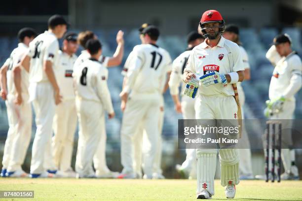 Callum Ferguson of South Australia walks back to the rooms after being dismissed by Andrew Holder of Western Australia during day four of the...