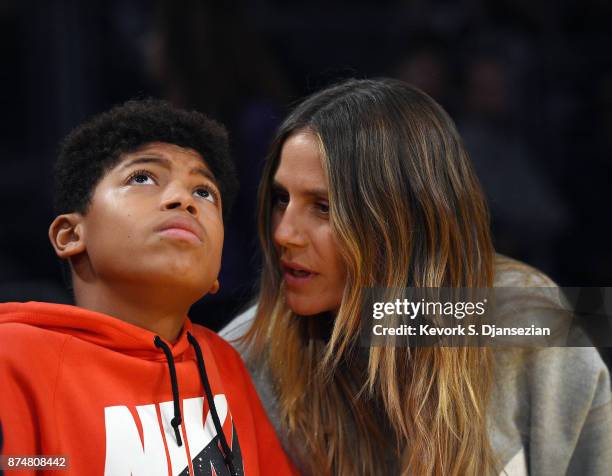 Heidi Klum and Henry Samuel attend the basketball game between Philadelphia 76ers and Los Angeles Lakers at Staples Center November 15 in Los...