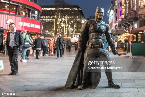 The character Batman from the Justice League film poses in character outisde the UK premiere during a photocall at The Leicester Square Odeon Cinema...