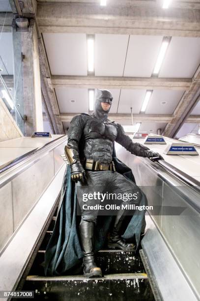 The character Batman from the Justice League film poses in character on the London Underground during a photocall en route to The Leicester Square...