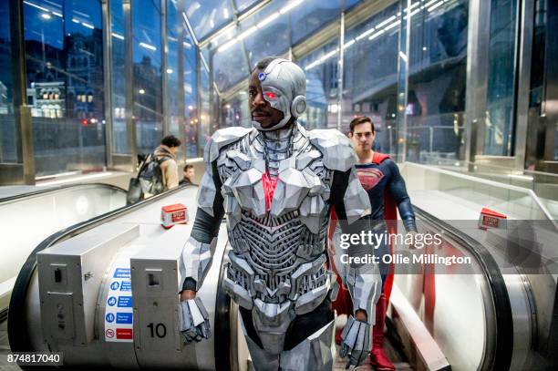The characters Cyborg and Superman from the Justice League film pose in character on the London Underground during a photocall en route to The...