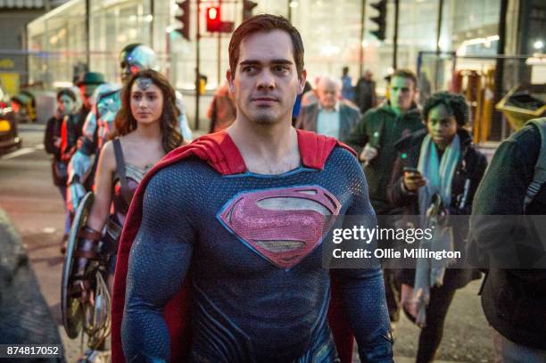 The characters Cyborg, Wonder Woman and Superman from the Justice League film poses in character outisde the UK premier during a photocall at The...