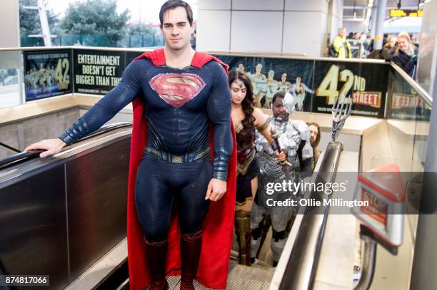 The characters Superman, Wonder Woman; Cyborg and Aquaman from the Justice League film pose in character on the London Underground during a photocall...