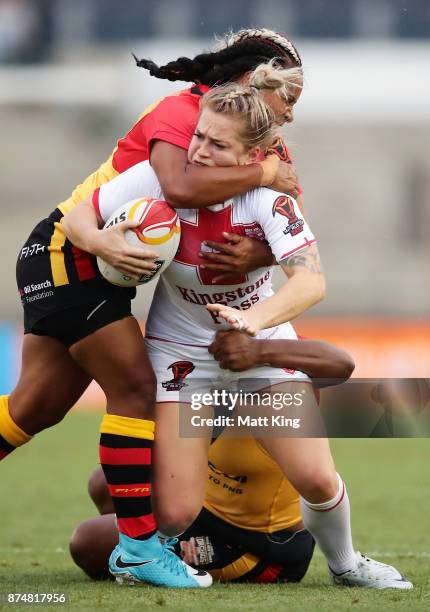 Shona Hoyle of England is tackled during the 2017 Women's Rugby League World Cup match between England and Papua New Guinea at Southern Cross Group...