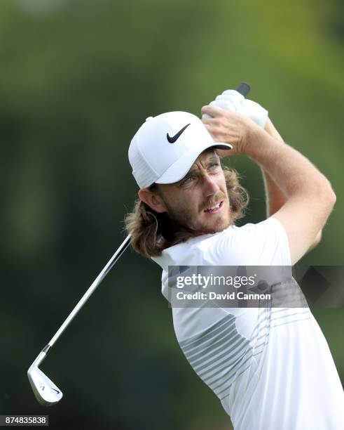 Tommy Fleetwood of England plays his second shot on the first hole during the first round of the DP World Tour Championship on the Earth Course at...