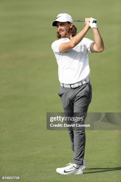 Tommy Fleetwood of England plays his second shot on the second hole during the first round of the DP World Tour Championship on the Earth Course at...