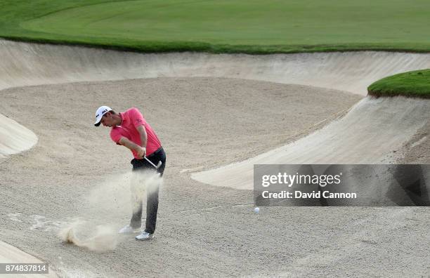 Justin Rose of England plays his second shot on the third hole during the first round of the DP World Tour Championship on the Earth Course at...