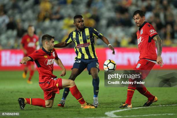 Kwabene Appiah-Kubi of the Mariners is contested by Benjamin Garrucio of Adelaide during the round seven A-League match between the Central Coast...