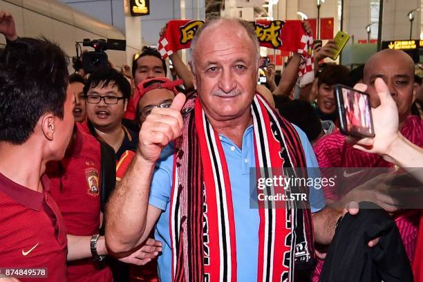 This photo taken on November 15, 2017 shows the Brazilian head coach of China's Guangzhou Evergrande club, Luiz Felipe Scolari , gesturing to the...