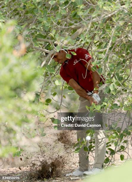 Rafa Cabrera Bello of Spain plays his second shot on the firsthole during the first round of the DP World Tour Championship on the Earth Course at...