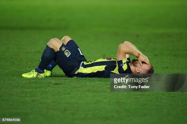 Connor Pain of the Mariners looks dejected after losing to Adelaide United during the round seven A-League match between the Central Coast Mariners...