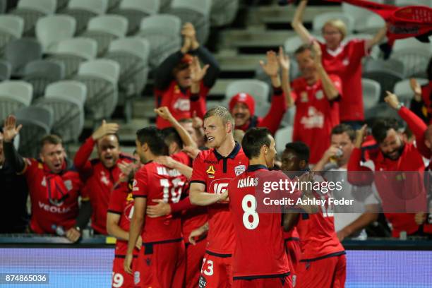 Adelaide United players and fans celebrate a goal from Ryan Kitto during the round seven A-League match between the Central Coast Mariners and...