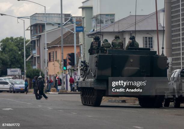 Group of soldiers seal off a main road to the parliament building within the military activities taking place in Harare, Zimbabwe on November 16,...