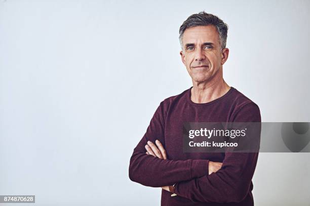 the embodiment of self confidence - one mature man only photos stock pictures, royalty-free photos & images