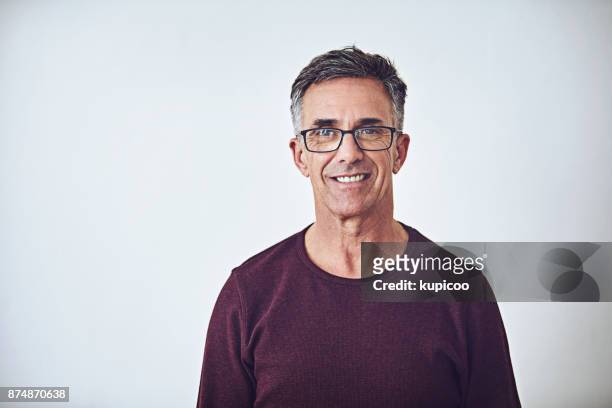 he has a casual demeanour - mature men stock pictures, royalty-free photos & images