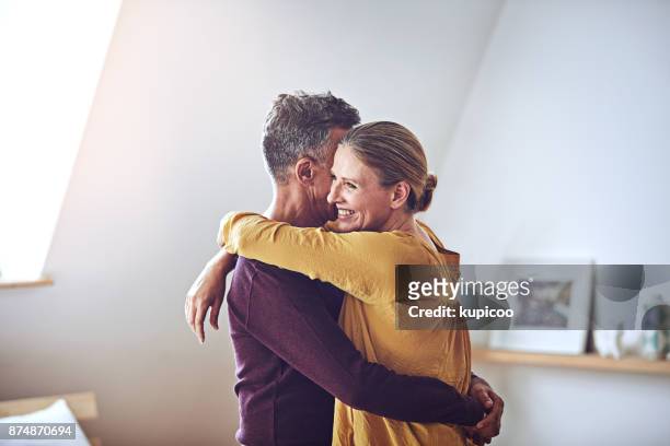 hold on tight and never let go - middle aged couple stock pictures, royalty-free photos & images