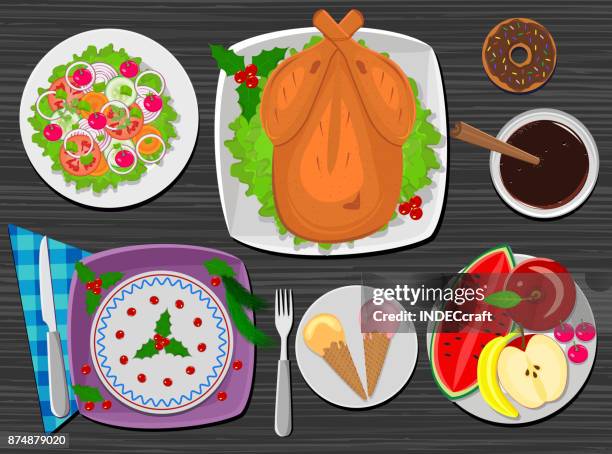 christmas dinner on table - christmas table plate stock illustrations