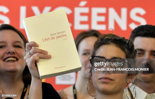 The head of the jury of the Prix Goncourt des Lyceens, Laure Humbert , presents the winning novel "The Art of Losing" by Alice Zeniter, in Rennes,...