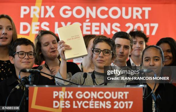 The head of the jury of the Prix Goncourt des Lyceens, Laure Humbert , presents the winning novel "The Art of Losing" by Alice Zeniter, in Rennes,...