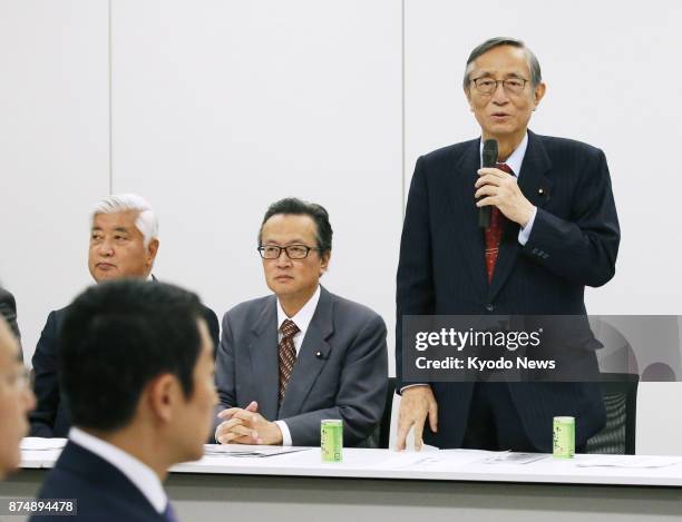 Hiroyuki Hosoda , a veteran Liberal Democratic Party lawmaker who heads the party's panel promoting constitutional reform, speaks at its meeting...