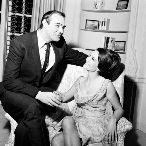 Parisienne actress Claudine Auger who will play Domino in the James Bond film Thunderball, seen here with Sean Connery during an interview with the...