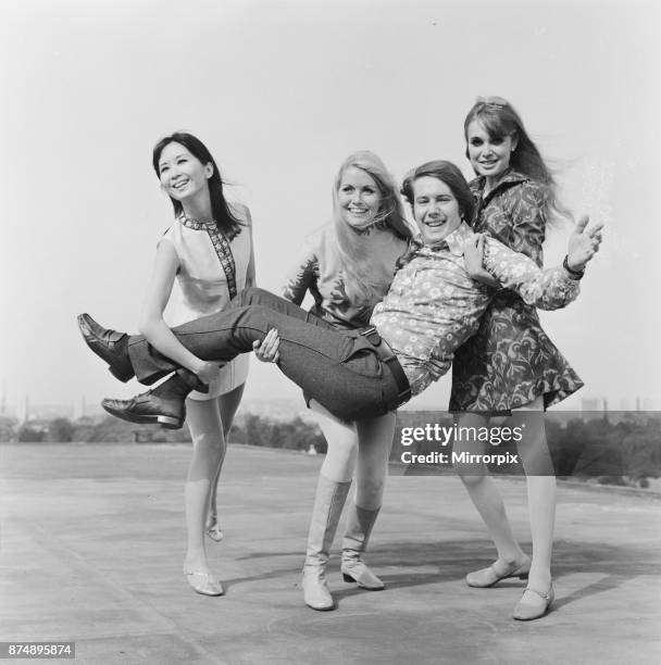 The three girls who star in the comedy film The Mini Mob, left to right: Lucille Soong, Gretchen regan and Madeline Smith, photographed with BBC disc...