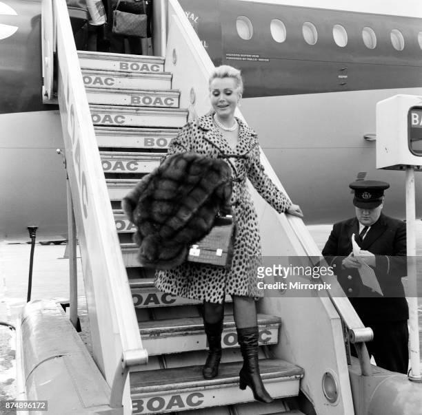 Actress Zsa Zsa Gabor arrives at London Heathrow Airport from New York Friday 20th September 1968. She was met by her daughter Constance Hilton aka...