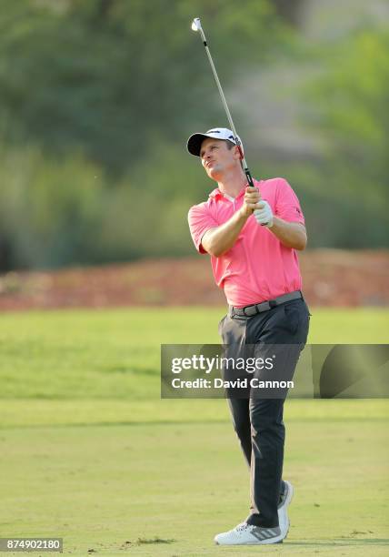 Justin Rose of England plays his second shot on the 16th hole during the first round of the DP World Tour Championship on the Earth Course at...