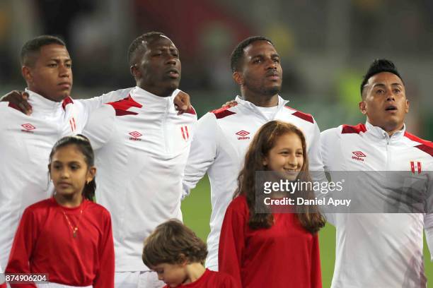 Andy Polo, Luis Advincula, Jefferson Farfan and Christian Cueva of Peru sing their national anthem prior a second leg match between Peru and New...