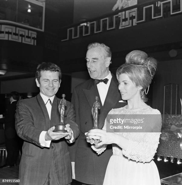 The British Film Academy Awards presented by Lord Mountbatten at Grosvenor House. Pictured, left to right, Best Supporting Actor Ian Holm for 'The...