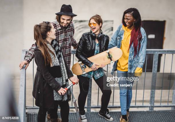 group of teenagers hanging out - boys and girls town stock pictures, royalty-free photos & images