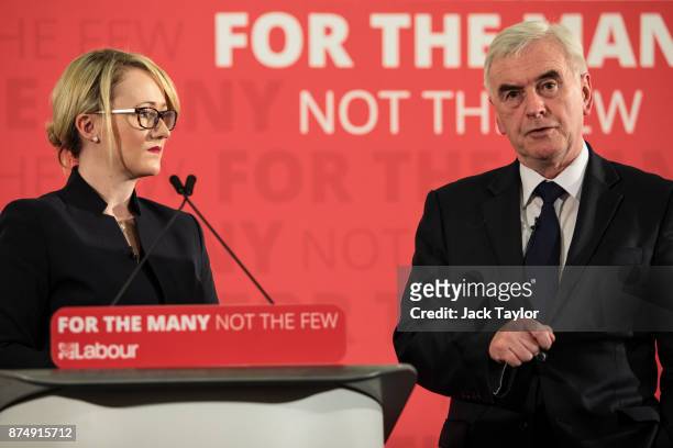 British Shadow Secretary of State for Business, Energy and Industrial Strategy Rebecca Long-Bailey looks on as Shadow Chancellor John McDonnell gives...