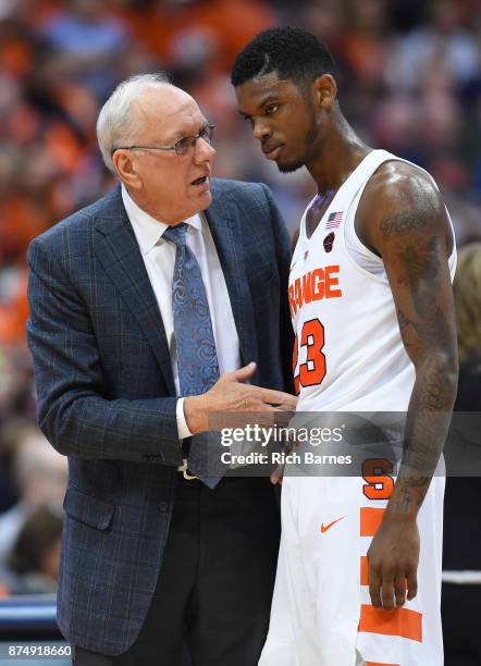 Head coach Jim Boeheim of the Syracuse Orange reacts to a play while talking with Frank Howard against the Iona Gaels during the second half at the...